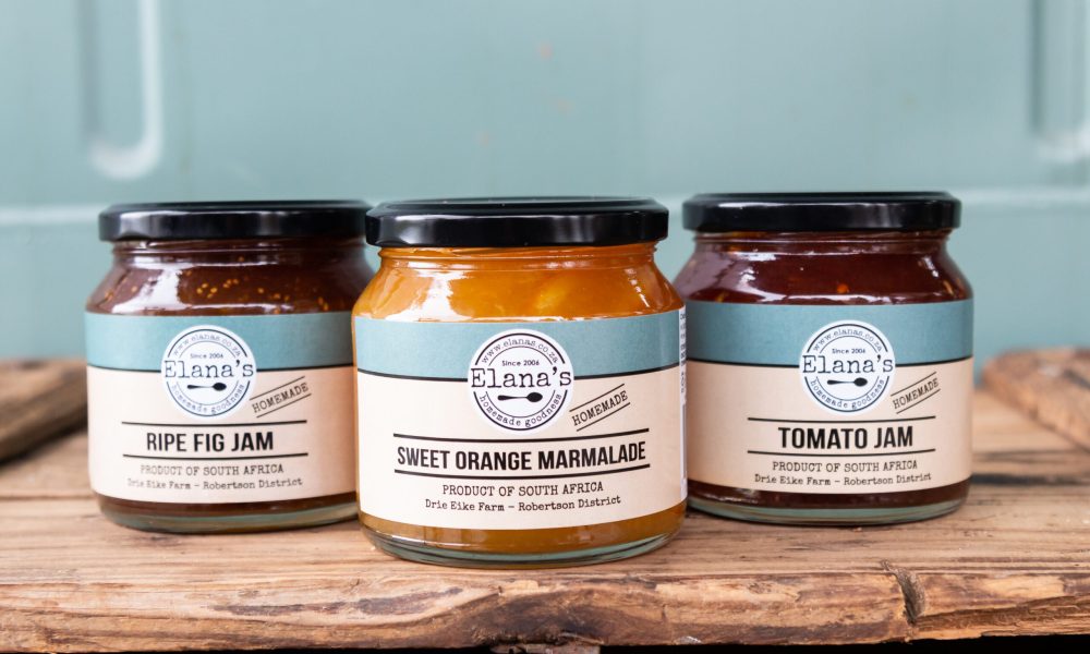 Jars of jam on a wooden board